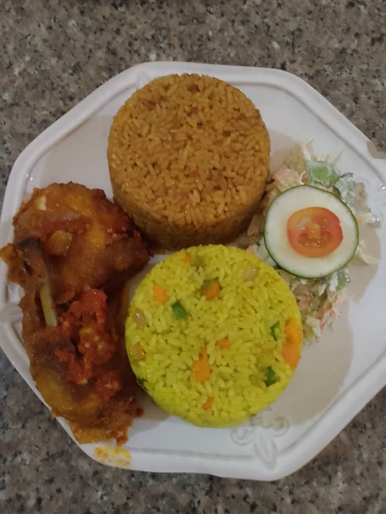 Fried rice & chicken with Extra jollof rice image